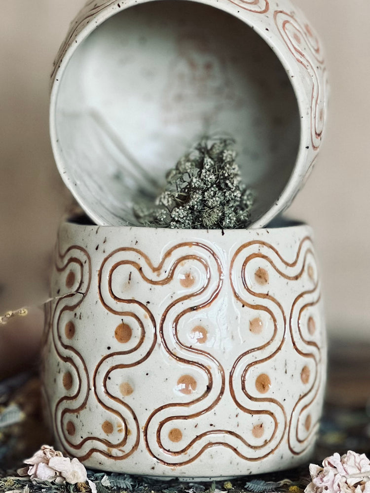 handleless mug, carved